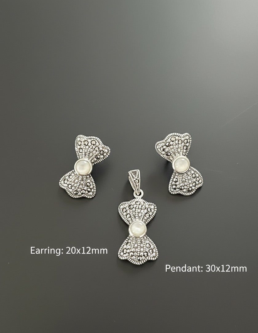 Timeless Grace – Mother of Pearl Bow Set in 925 Silver & Marcasite